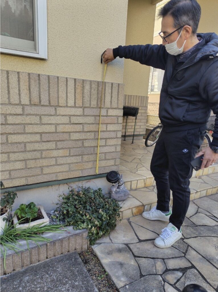 外装診断をしているK.S美装の代表の写真